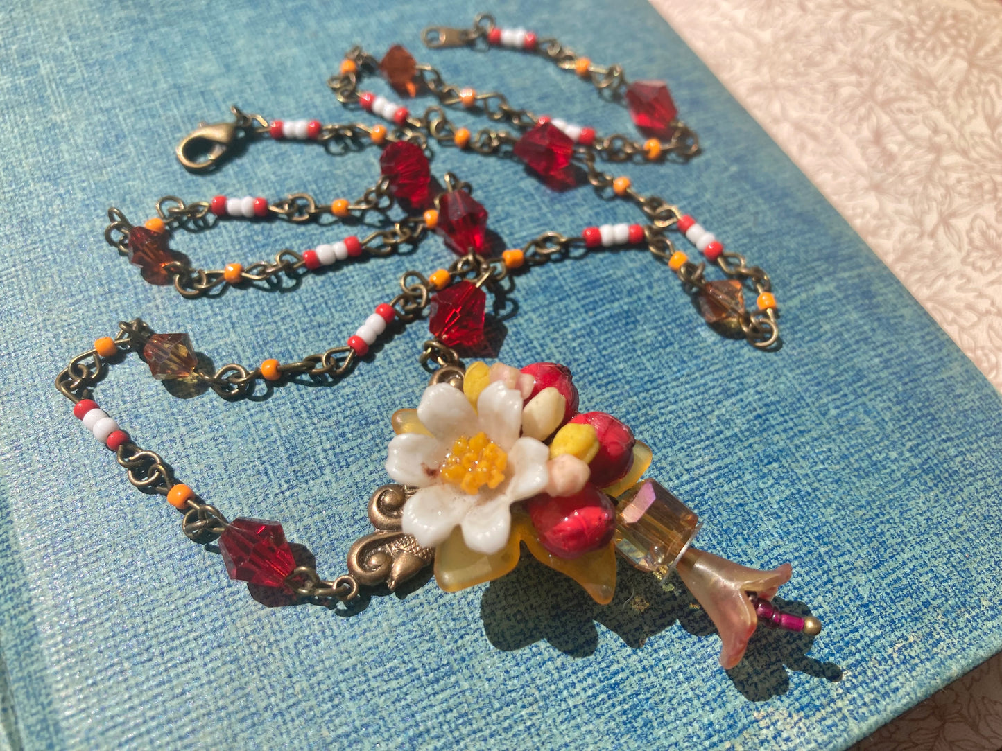 Red Floral beaded necklace - Swarovski crystals - upcycled vintage charms