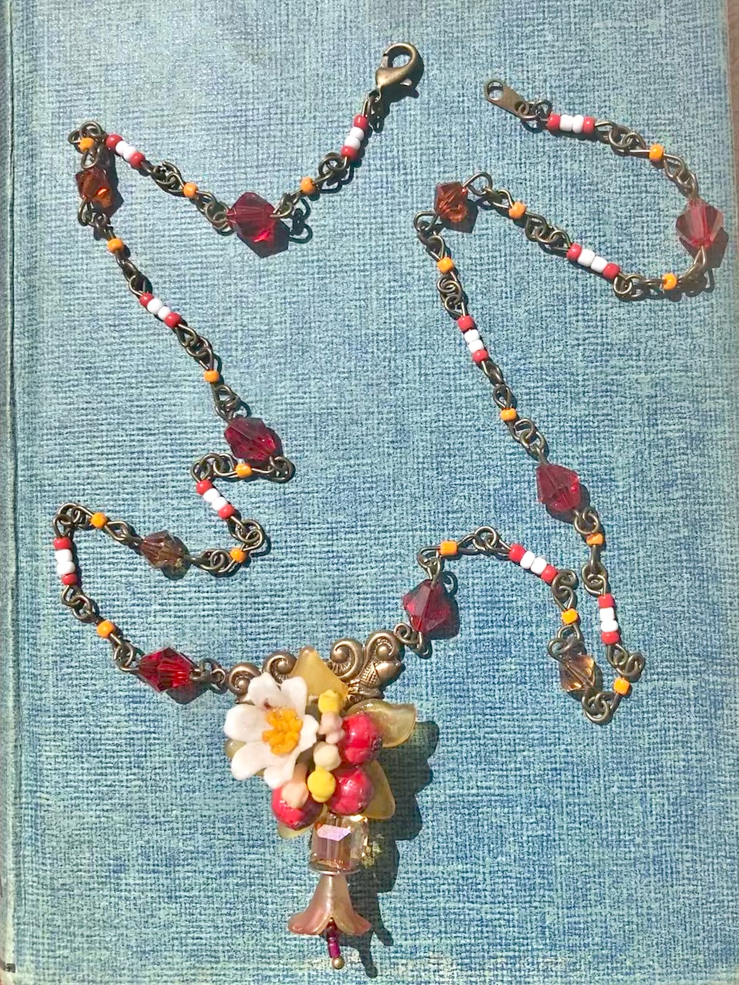 Red Floral beaded necklace - Swarovski crystals - upcycled vintage charms