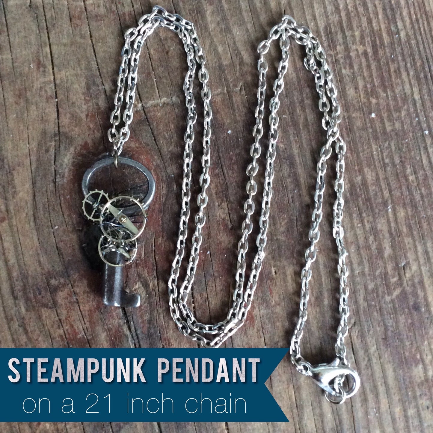Tiny StEaMpUnK necklace with a REAL - AnTiQuE - key and watch parts and gears