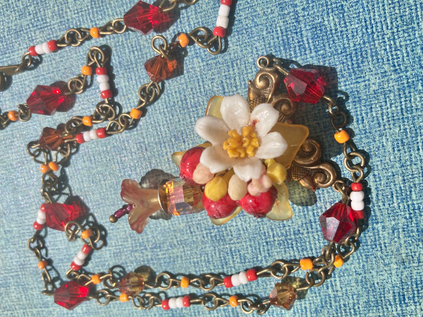 Red Floral beaded necklace - Swarovski crystals - upcycled vintage charms