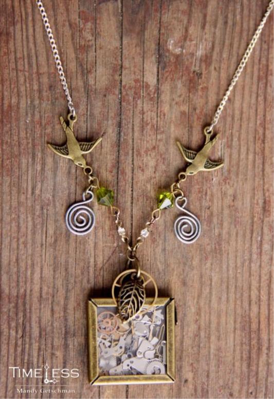 Cottagecore wHiMsiCaL sparrow bird necklace with glass pendant filled with StEaMpUnK sprockets and gears