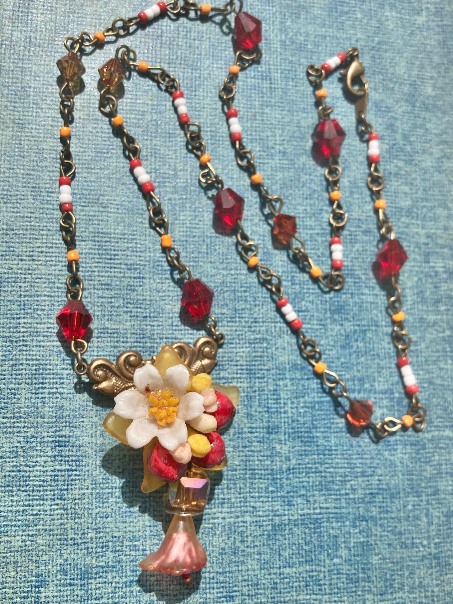 Red Floral beaded necklace - Swarovski crystals - upcycled vintage charms